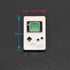 A cute little enamel pin of a white Nintendo Game Boy