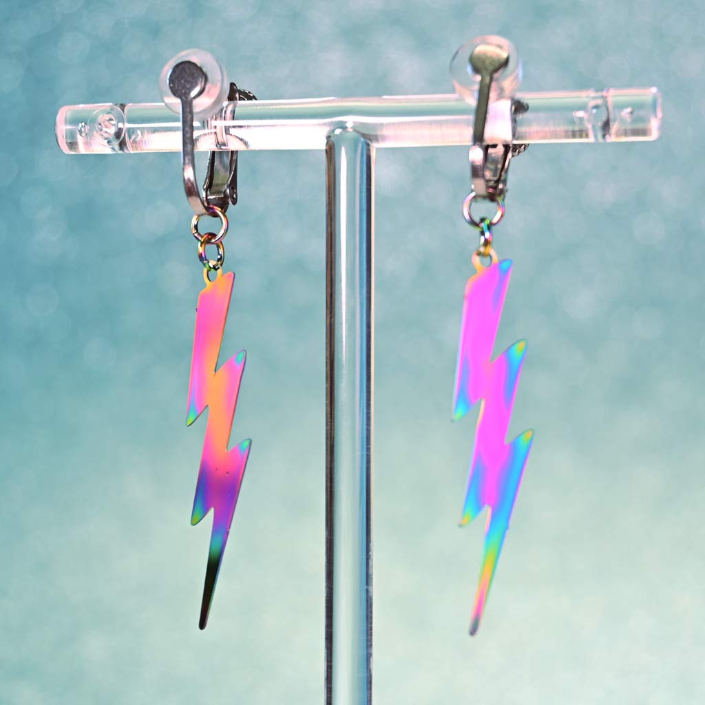 This are really cool metal earrings that have been ion electroplated so they reflect the light in a spectrum of rainbow colors. Depending upon how they hit the light, their color will change!